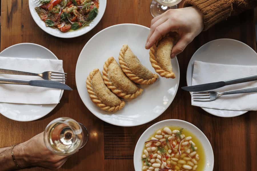 Buenos Aires: Local Foodie Adventure with Sherpa Food Tours - Stop 1: A hole-in-the-wall deli where empanadas kick things off